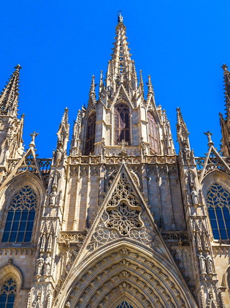 Cathedral of Barcelona facade with intricate Gothic architecture.