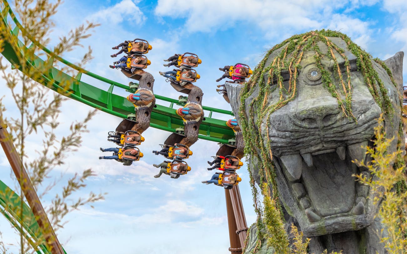 Riders on Mandrill Mayhem rollercoaster at World of Jumanji, Chessington World of Adventures Resort.