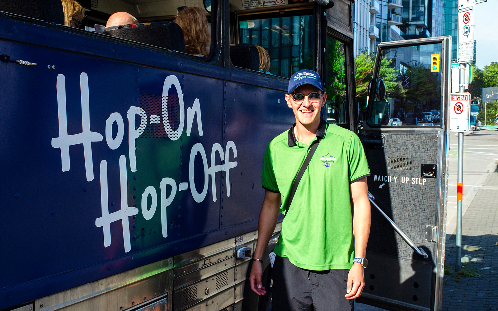 Hop on Hop off tour bus crew member in Madina