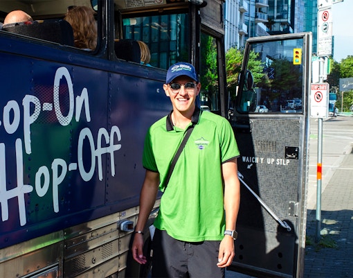 Hop on Hop off tour bus crew member in Madina