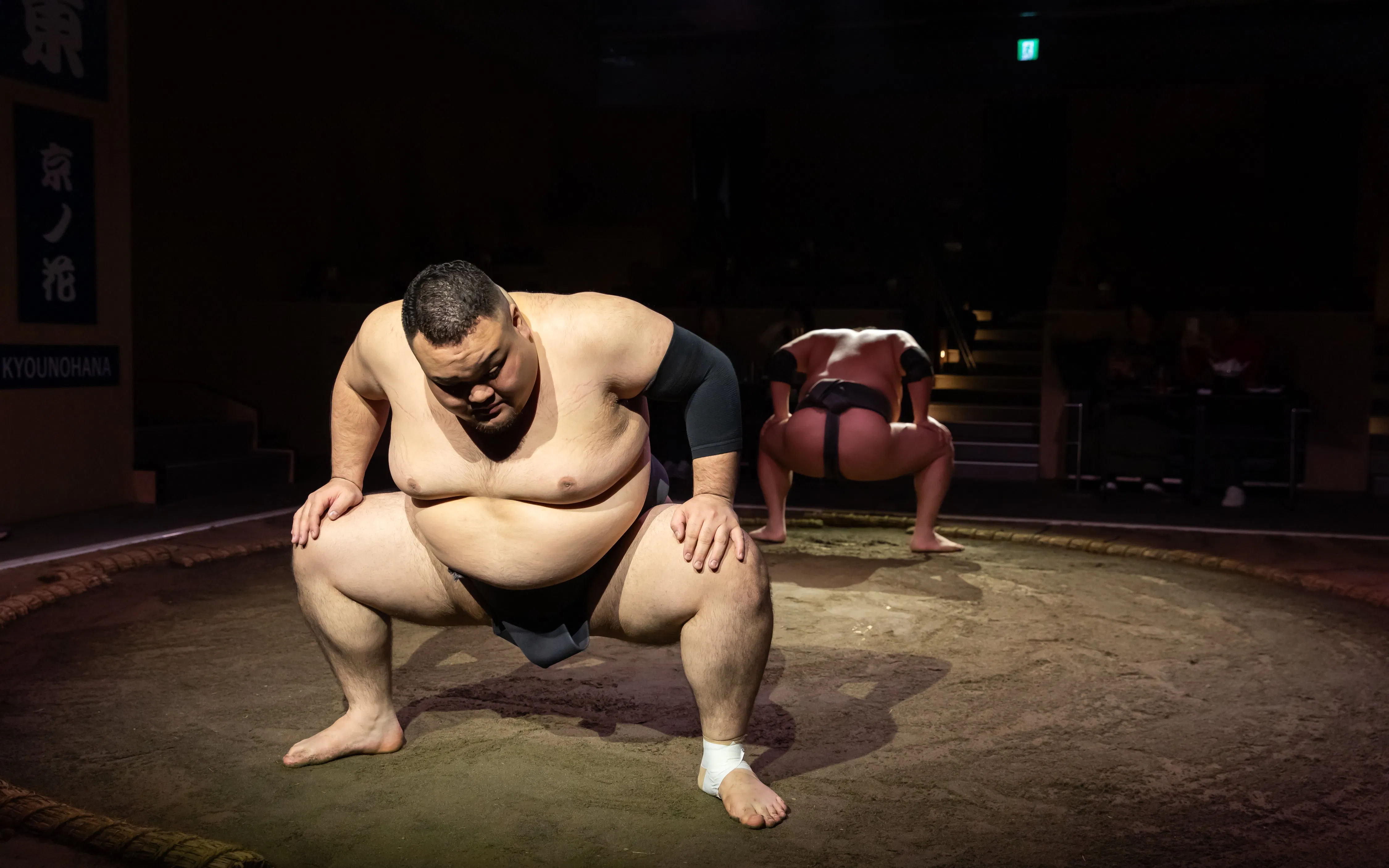 Sumo wrestlers preparing for a match at Kyoto Sumo Entertainment Show.