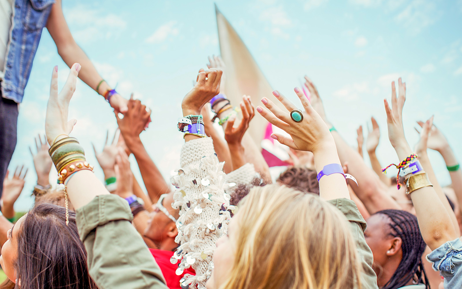 Canal view with boats and historic buildings in Amsterdam during July.