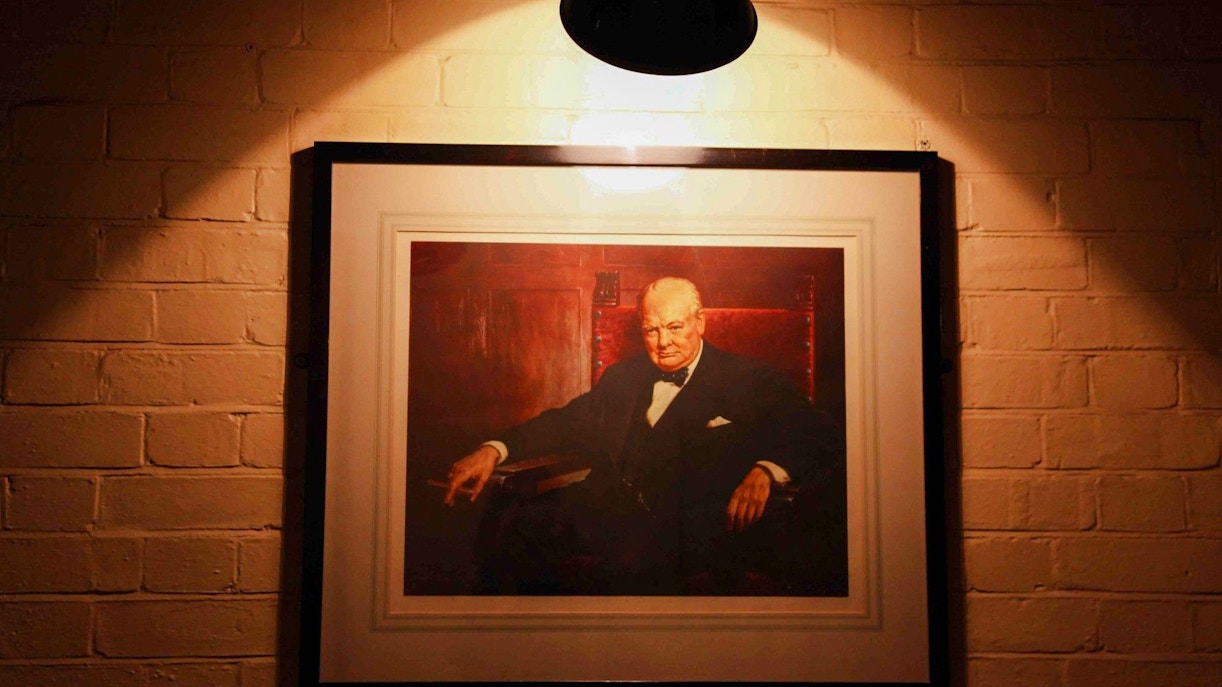 Portrait of Winston Churchill in the Churchill War Rooms, London.