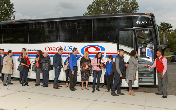 Passengers boarding Coach USA bus from Chicago O'Hare to Milwaukee.