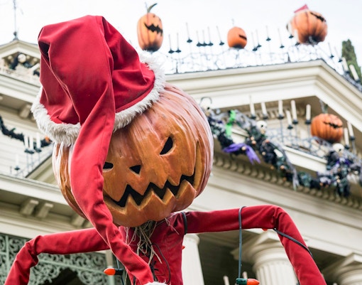 Pumpkin-headed figure in Santa hat at Disneyland's Haunted Mansion Holiday.