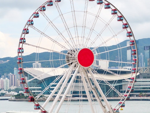 Hong Kong Observation Wheel with city skyline in the background.