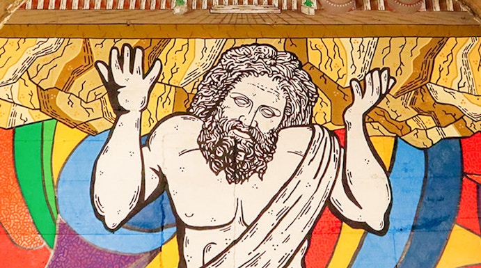 Mural of Atlas holding up the world in Bourbon Tunnel, Naples.