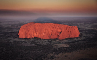 Uluru at sunset viewed from a helicopter, Northern Territory, Australia.