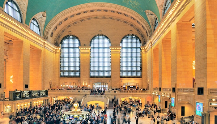 Grand Central Terminal New York interior with iconic clock and bustling commuters.