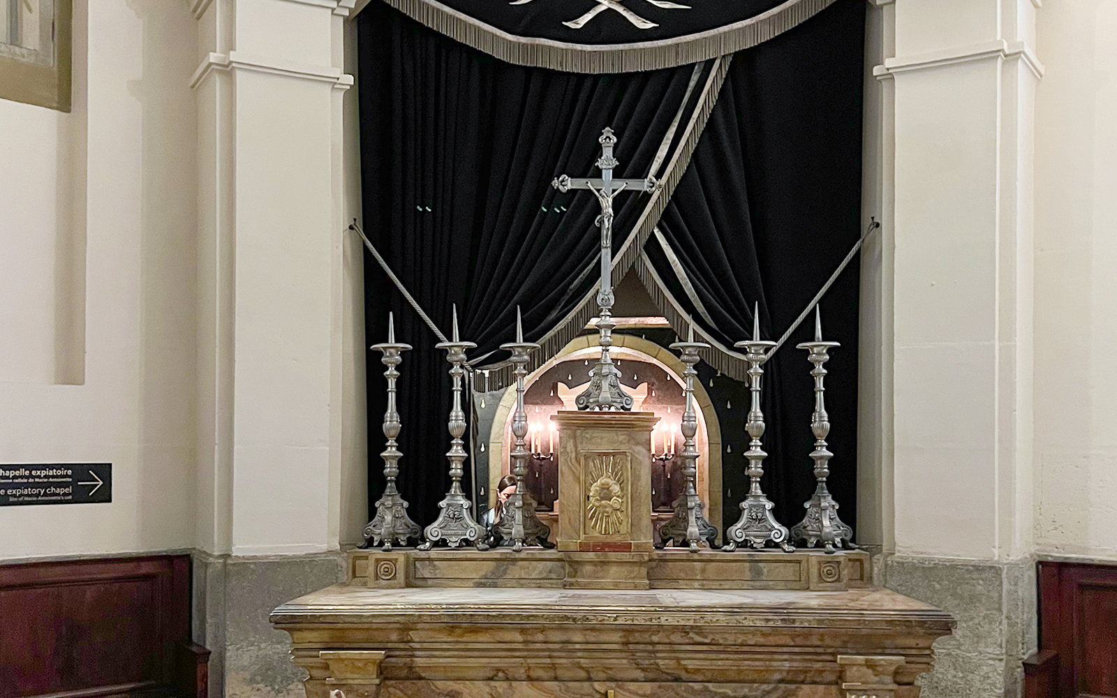 Altar with silver candlesticks and cross in Sainte Chapelle, Paris.