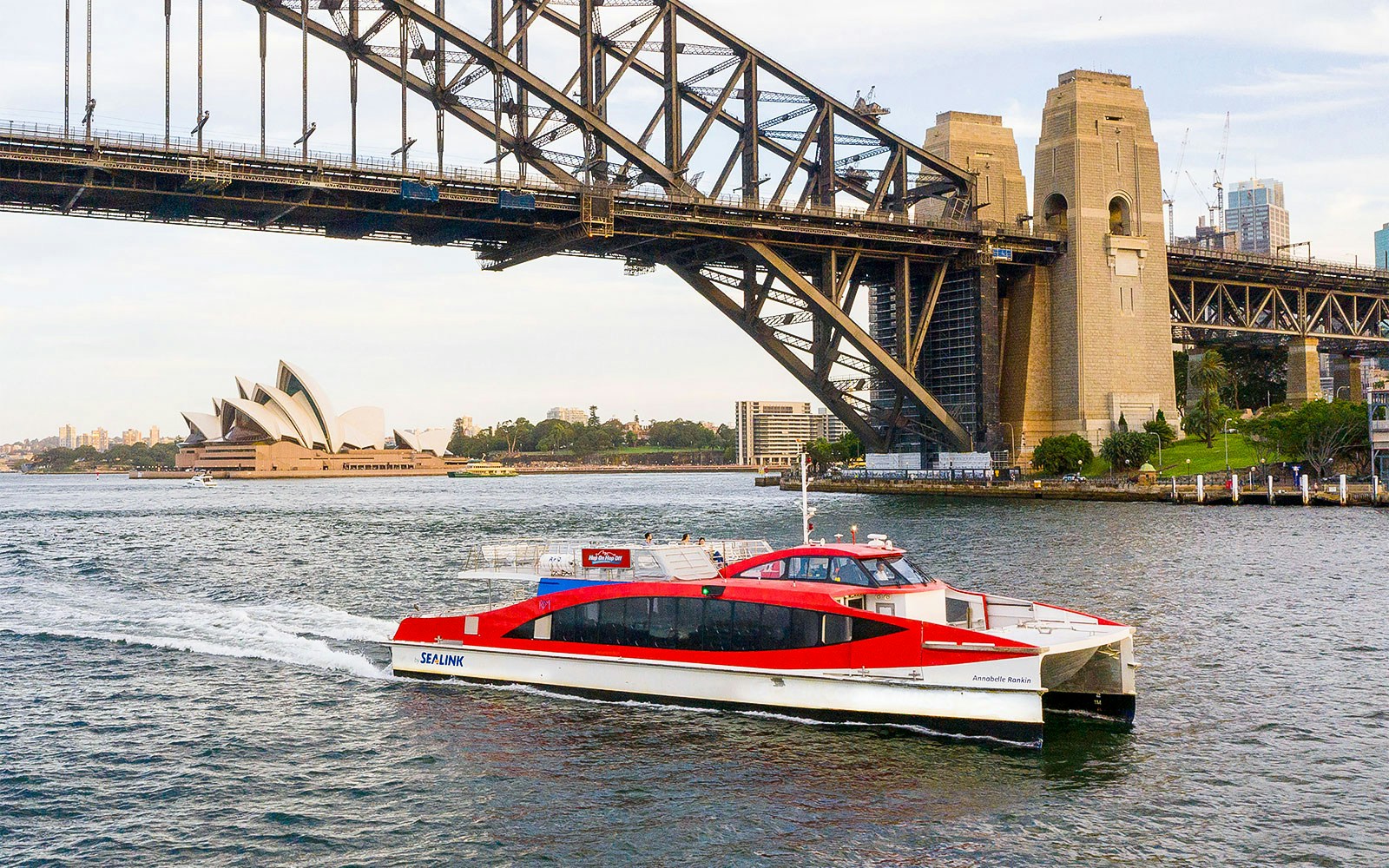 Sydney Harbour sightseeing cruise with view of iconic Sydney Opera House and Harbour Bridge.