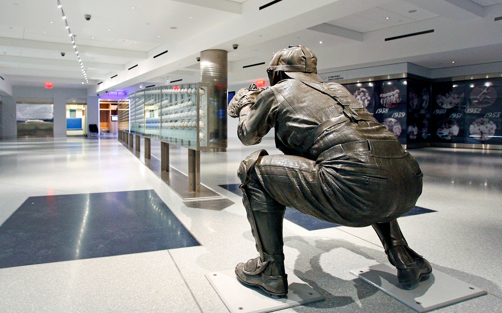 Catcher statue inside Yankees Stadium museum during Classic Stadium Tour.