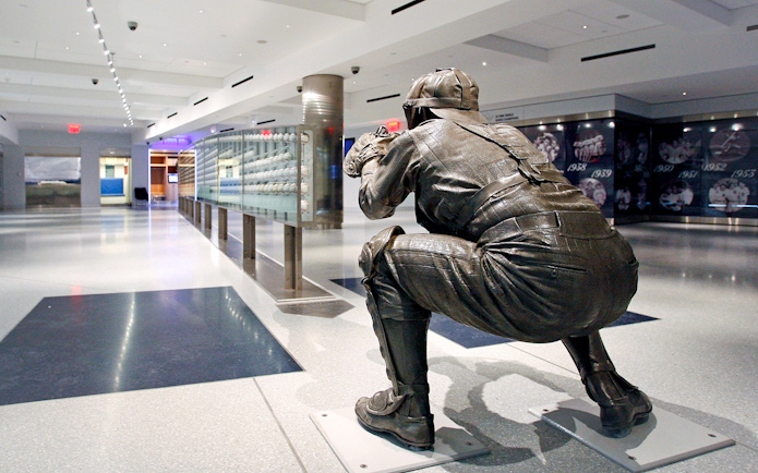 Catcher statue inside Yankees Stadium museum during Classic Stadium Tour.
