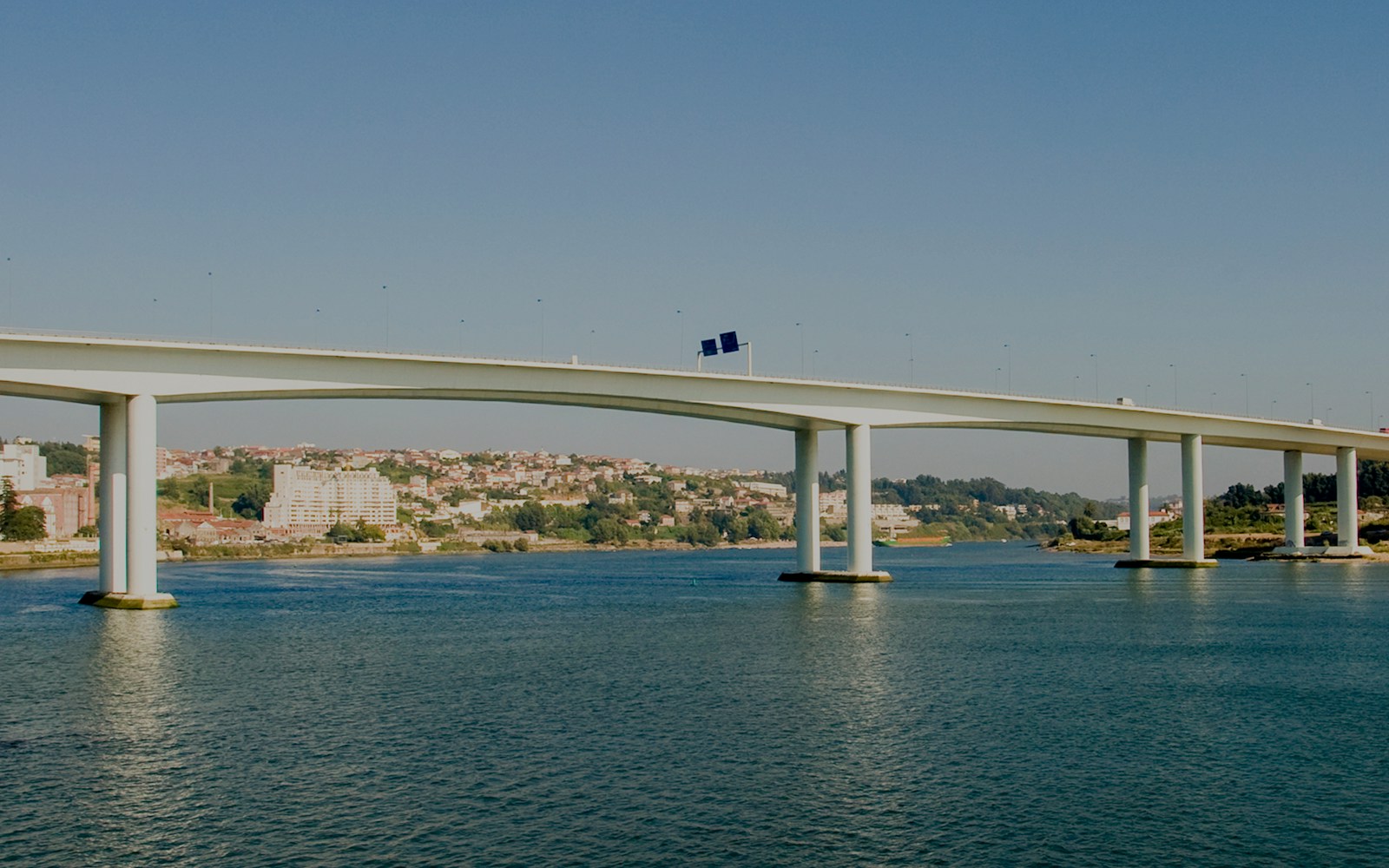 Freixo Bridge spanning over the Douro River in Porto, Portugal.