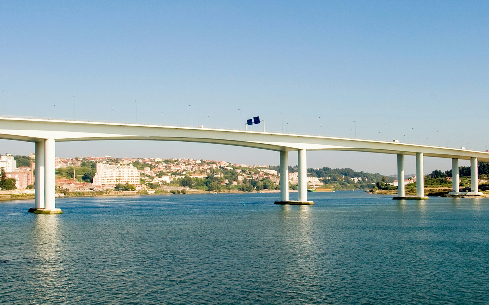 Freixo Bridge spanning over the Douro River in Porto, Portugal.
