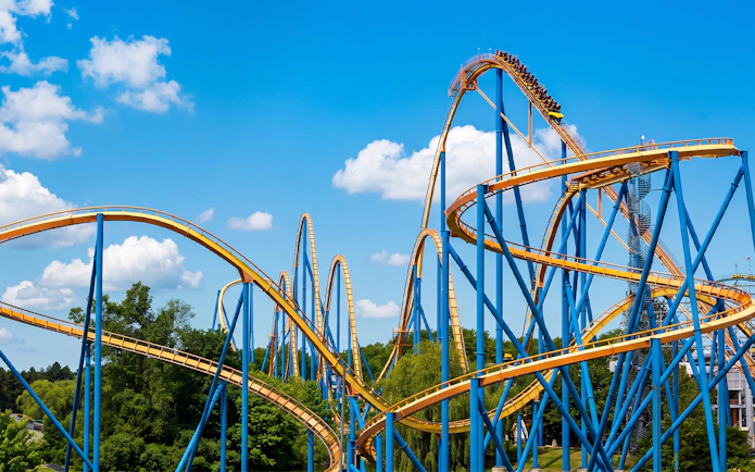 Roller coaster Behemoth at Canada's Wonderland with blue sky backdrop.
