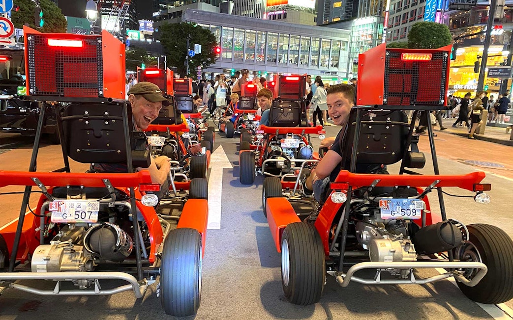Go-karts driving through Akihabara streets during 1-hour tour experience.