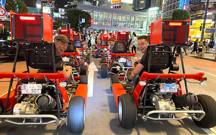 Go-karts driving through Akihabara streets during 1-hour tour experience.