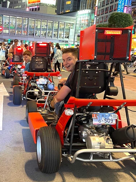 Go-karts driving through Akihabara streets during 1-hour tour experience.