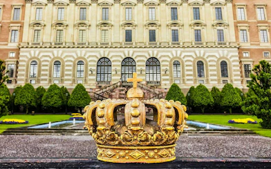 Golden crown sculpture in front of the Royal Palace, Stockholm.