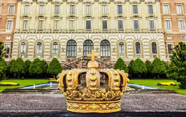 Golden crown sculpture in front of the Royal Palace, Stockholm.