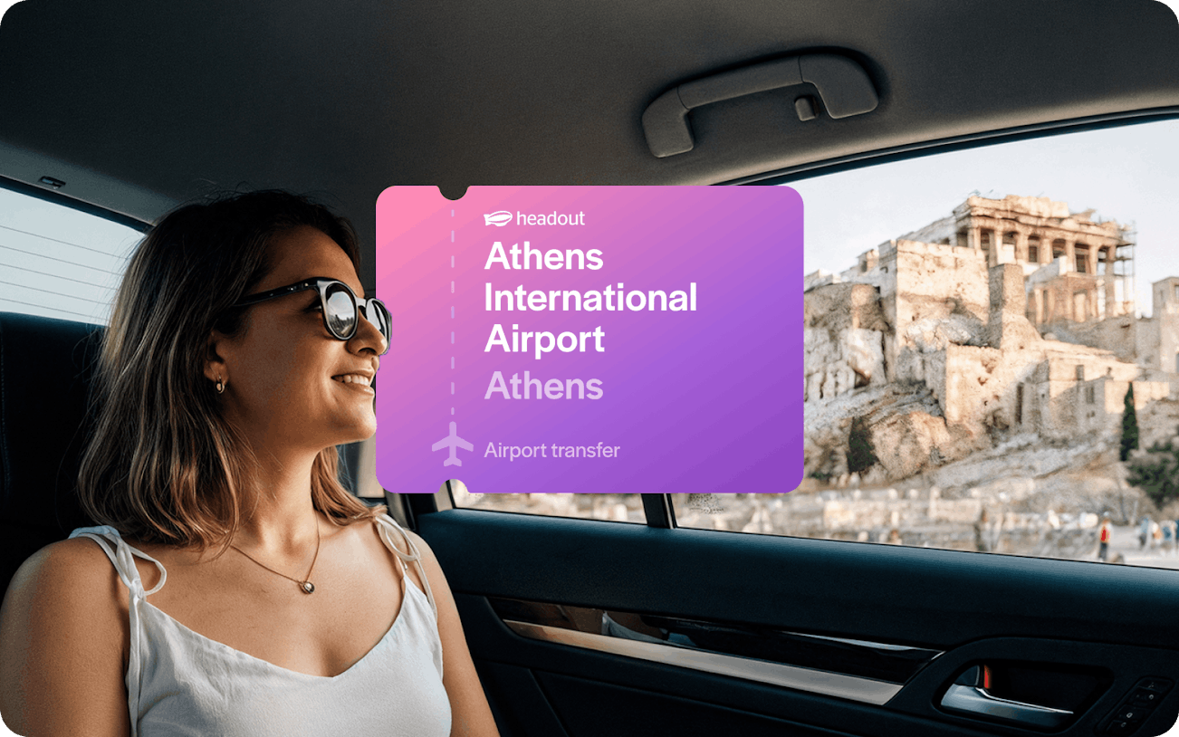 Woman in car with view of Acropolis, Athens International Airport transfer.