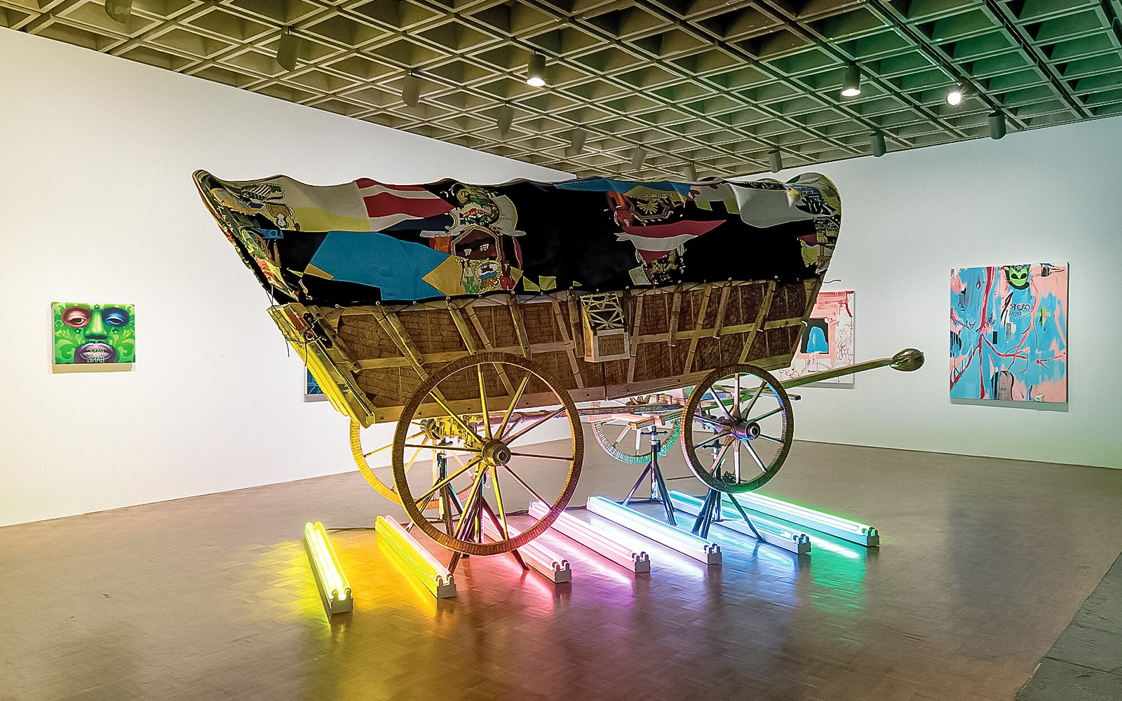 Visitors exploring the 2006 Biennial: Day for Night exhibition in a spacious art gallery