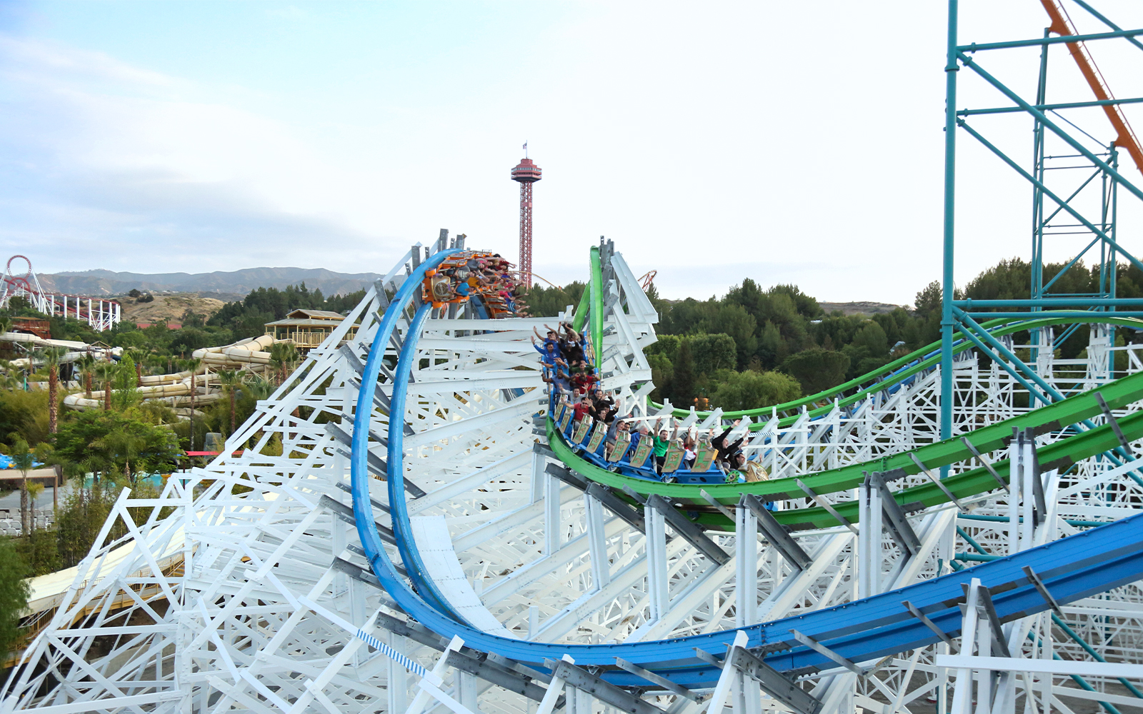 Roller coaster riders on Twisted Colossus at Six Flags Magic Mountain.