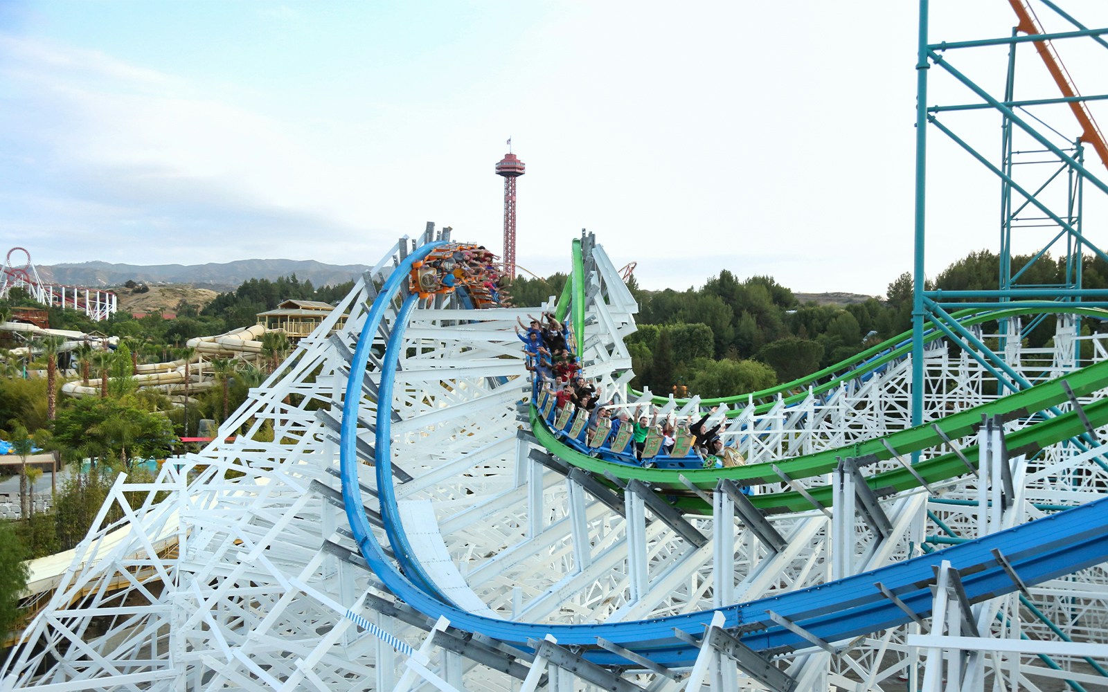 Roller coaster riders on Twisted Colossus at Six Flags Magic Mountain.