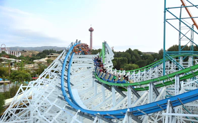 Roller coaster riders on Twisted Colossus at Six Flags Magic Mountain.