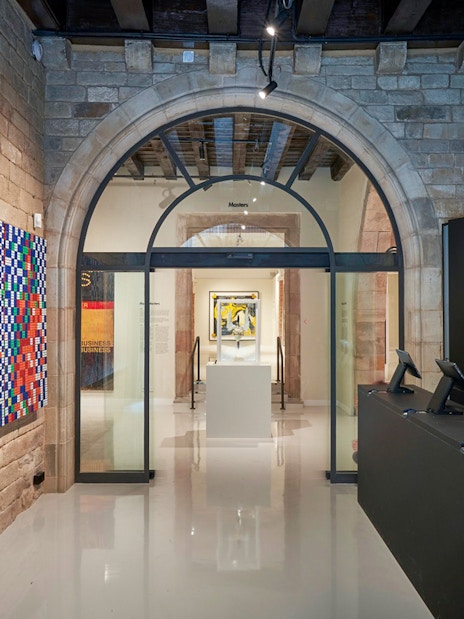 Moco Museum entrance with colorful artwork in Barcelona, Spain.