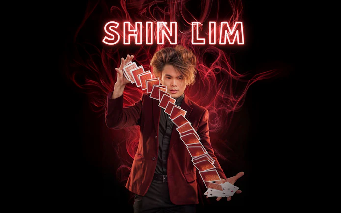 Magician performing card trick at Shim Lim show, Las Vegas.