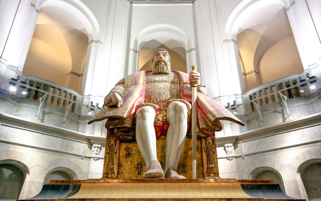Seated statue at the main entrance of Vasa Museum, Stockholm, Sweden.