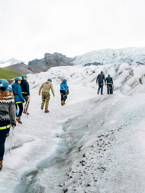 Guests trekking through ice maze and glacier crevasses in Skaftafell, Iceland.