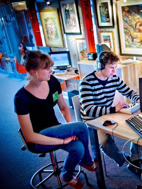Visitors engaging with interactive exhibits at NEMO Science Museum.