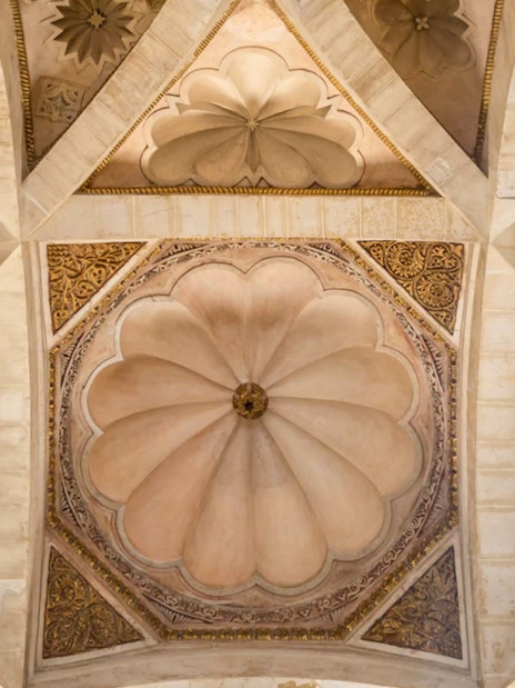 Ceiling detail of Cordoba Mosque-Cathedral with intricate geometric patterns.