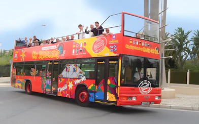 Sightseers on a City Sightseeing Hop on Hop off bus in Benalmadena.