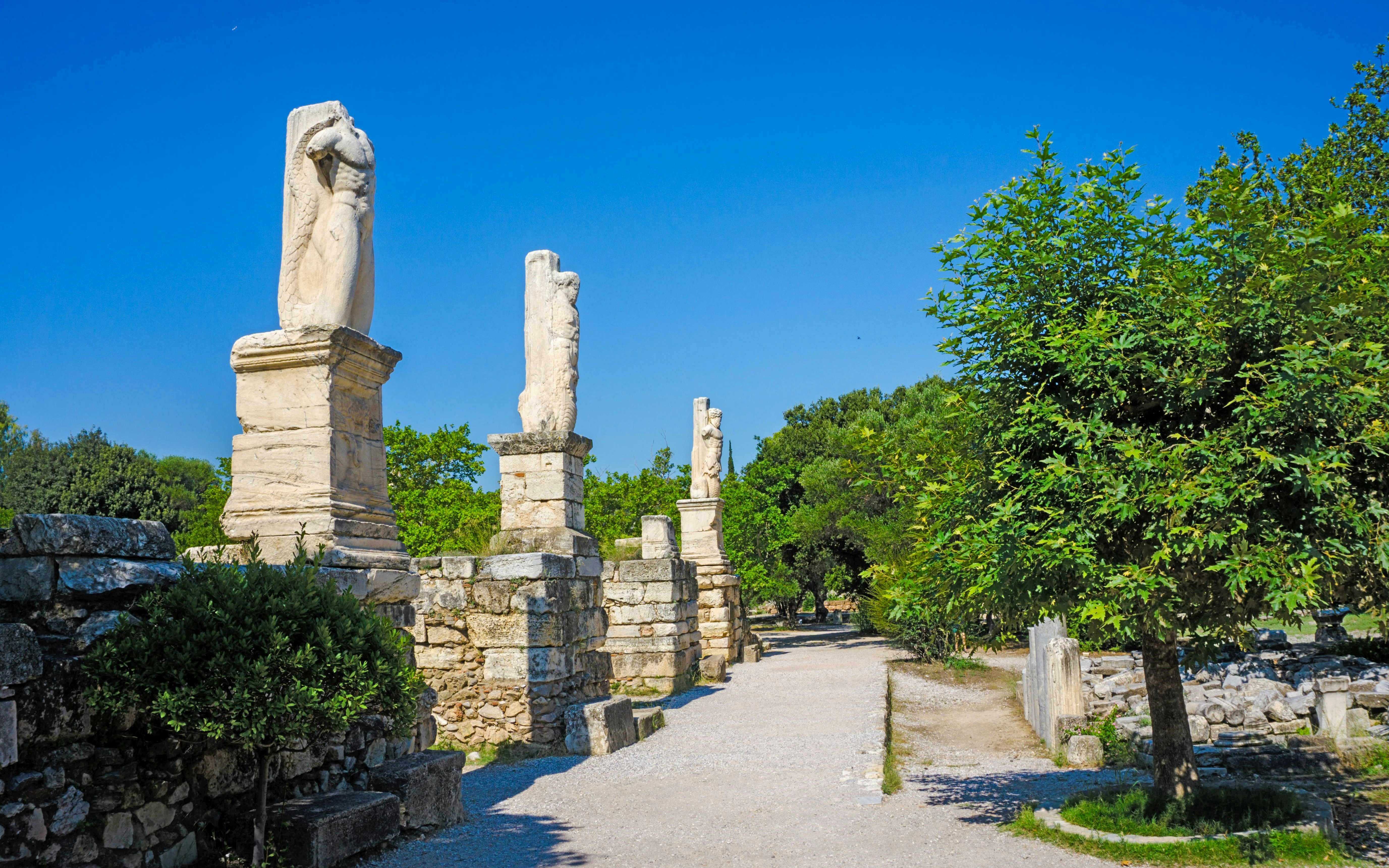 Ancient Greek statues at an excavation site in the Ancient Agora, Athens.