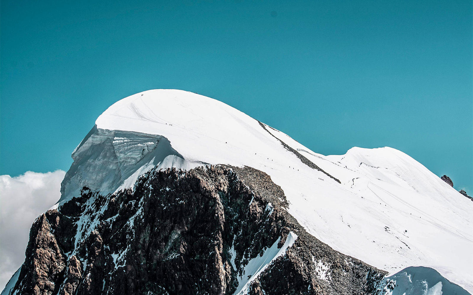 Snow-covered peak of Klein Matterhorn near Gornergrat Railway, Switzerland.