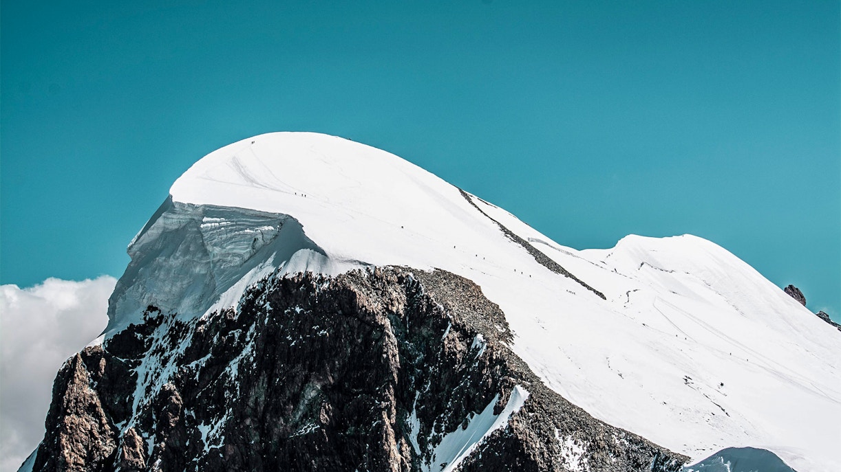 Snow-covered peak of Klein Matterhorn near Gornergrat Railway, Switzerland.