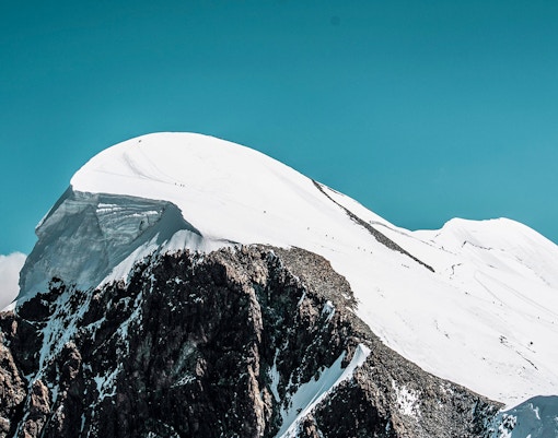 Snow-covered peak of Klein Matterhorn near Gornergrat Railway, Switzerland.