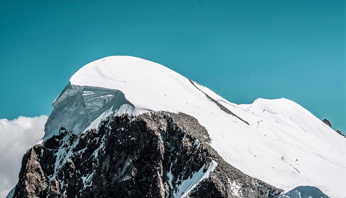 Snow-covered peak of Klein Matterhorn near Gornergrat Railway, Switzerland.