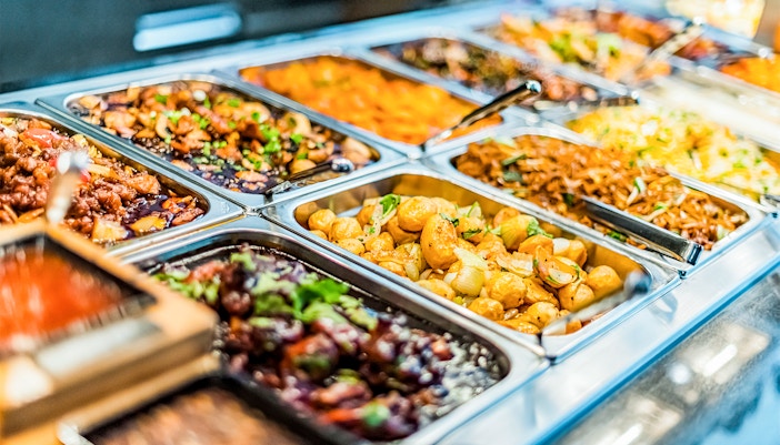 Dubai Mall shoppers exploring luxury stores and vibrant displays.