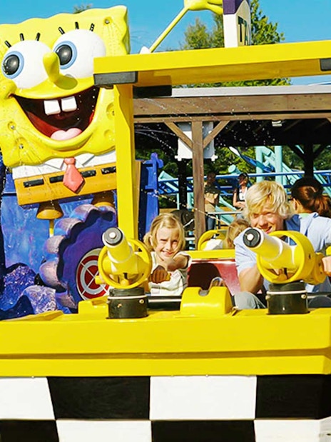 Visitors enjoying a boat ride at Spongebob-themed attraction in Movie Park.