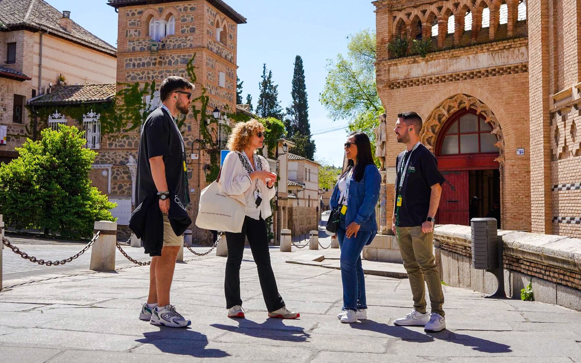 Tour group exploring historic architecture in Toledo, Spain.