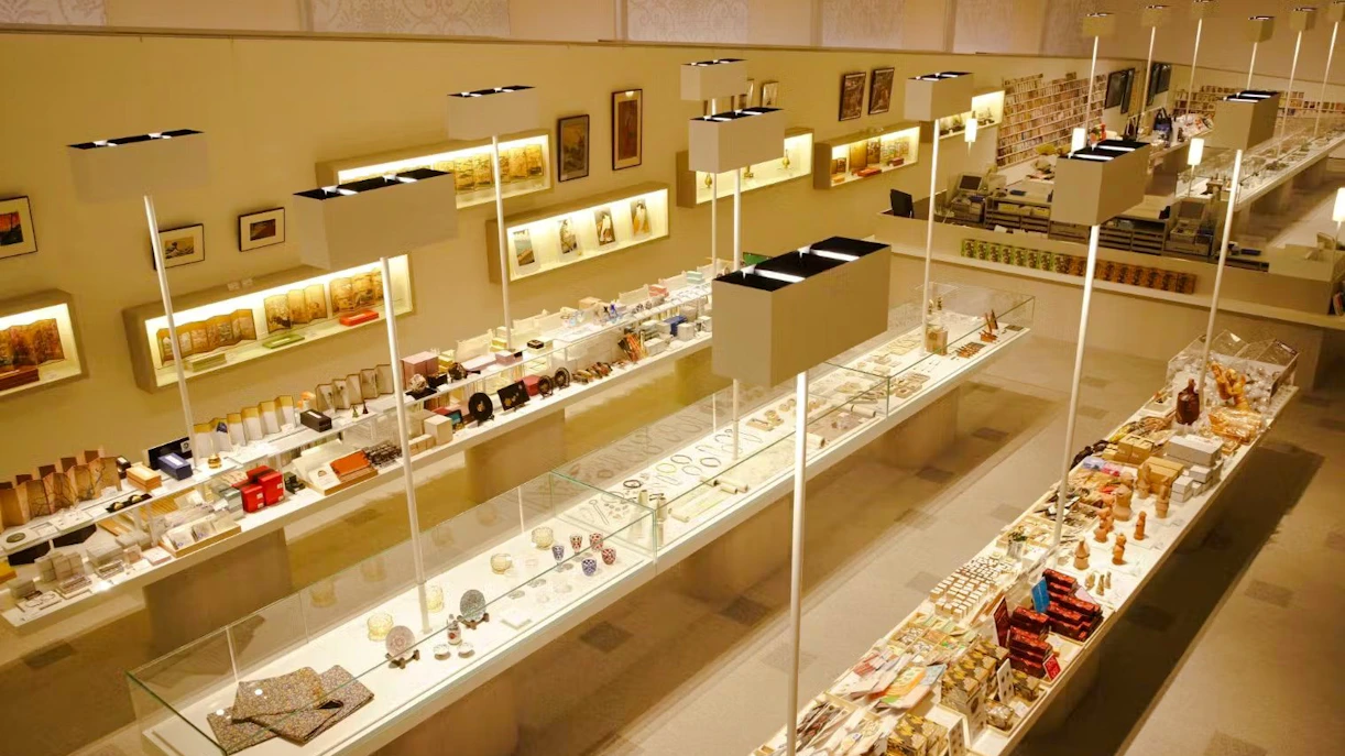 Tokyo National Museum Shop interior with display cases of souvenirs and art items.