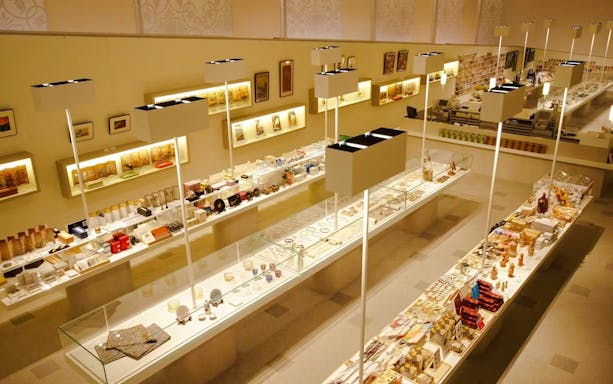 Tokyo National Museum Shop interior with display cases of souvenirs and art items.