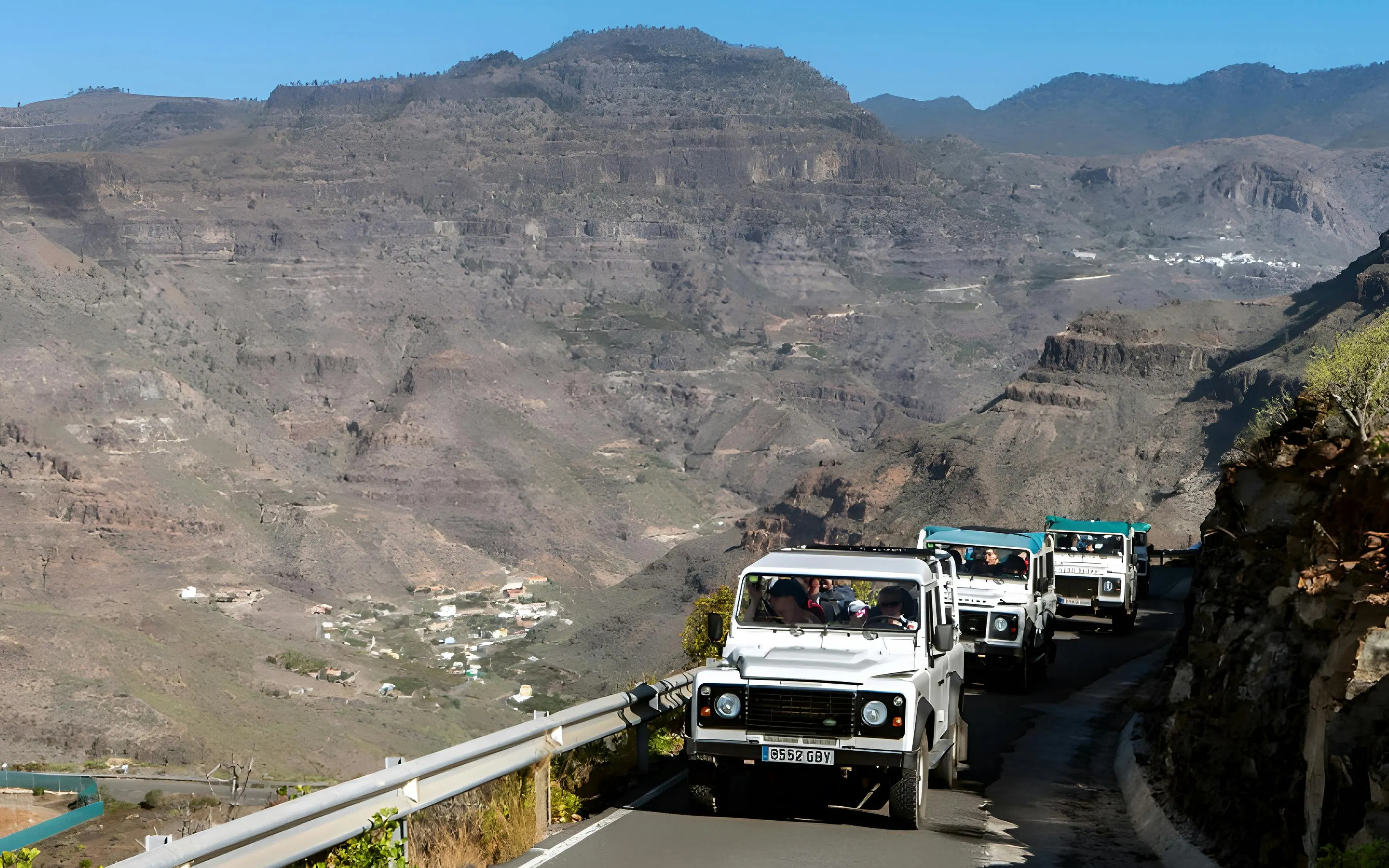 Jeep convoy on a mountain road during Gran Canaria safari tour.