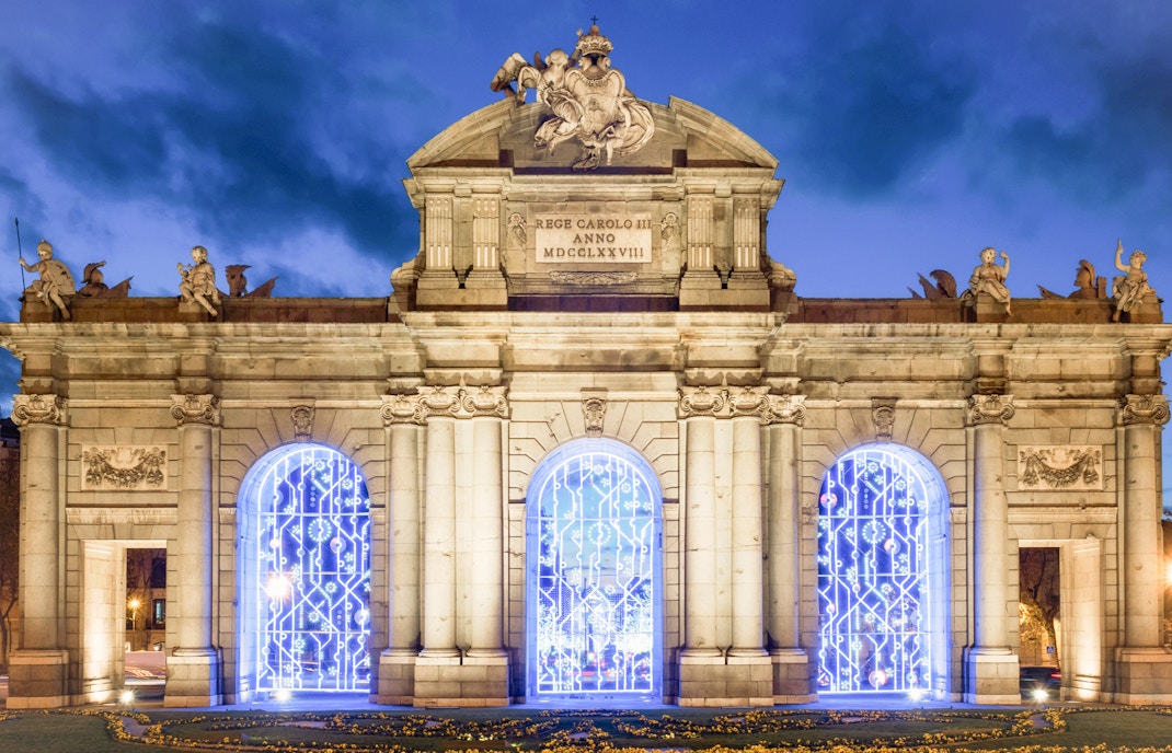 The Alcala Gate illuminated by Christmas
