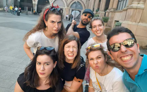 Group of friends enjoying Milan's Lost Duke city exploration game.